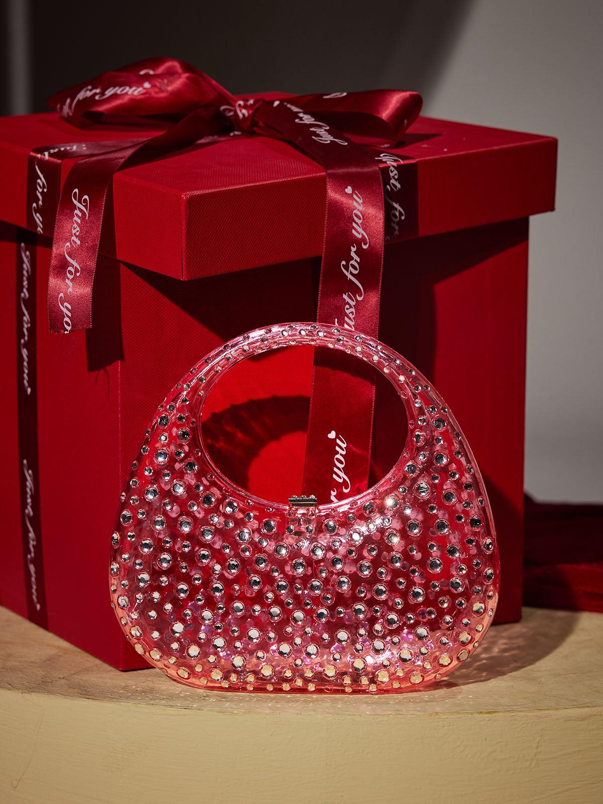 The Ultimate Fashion Statement: Asher Clear Embellished Bag In Pink