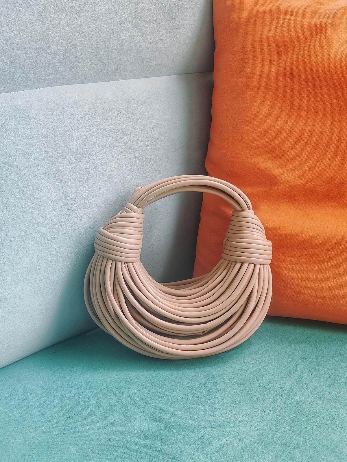The Camila Double Knot Tote Bag In Apricot: A Must-Have Fashion Accessory