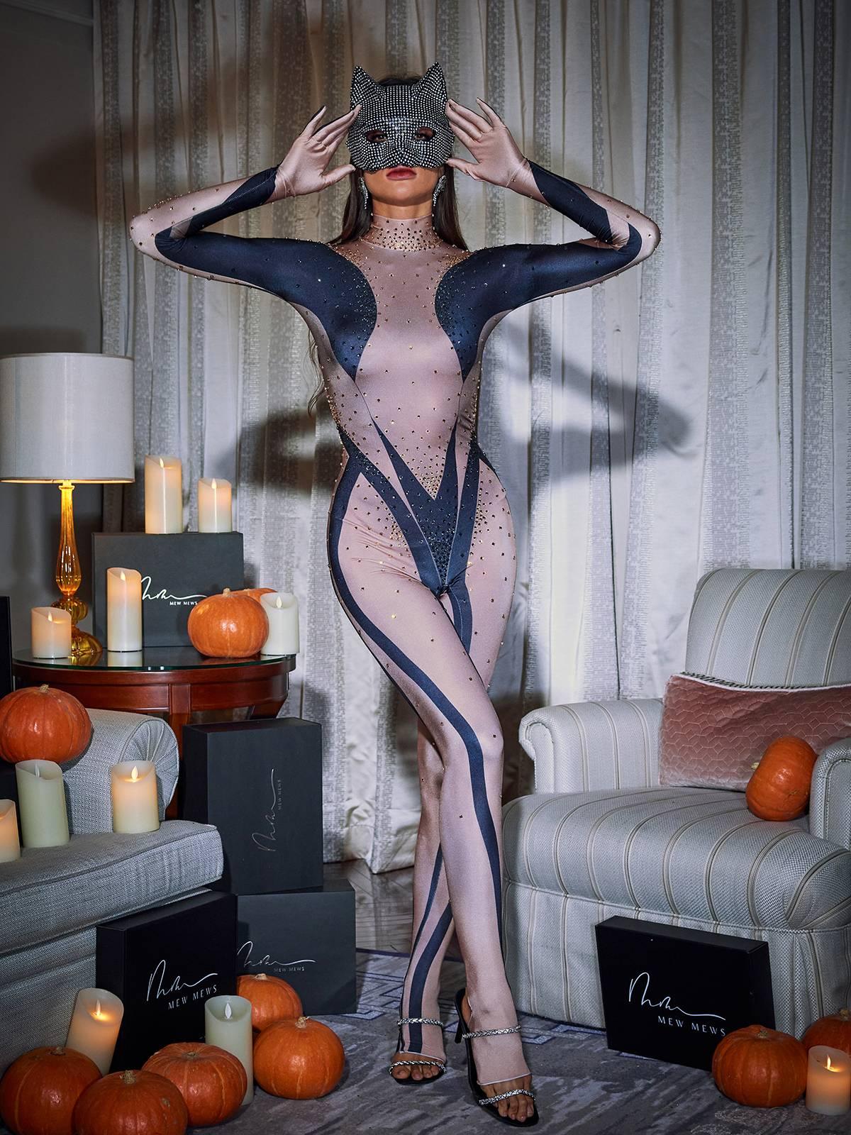Carmelo Body Printed Rhinestone Gloves Jumpsuit: A Fashion Statement