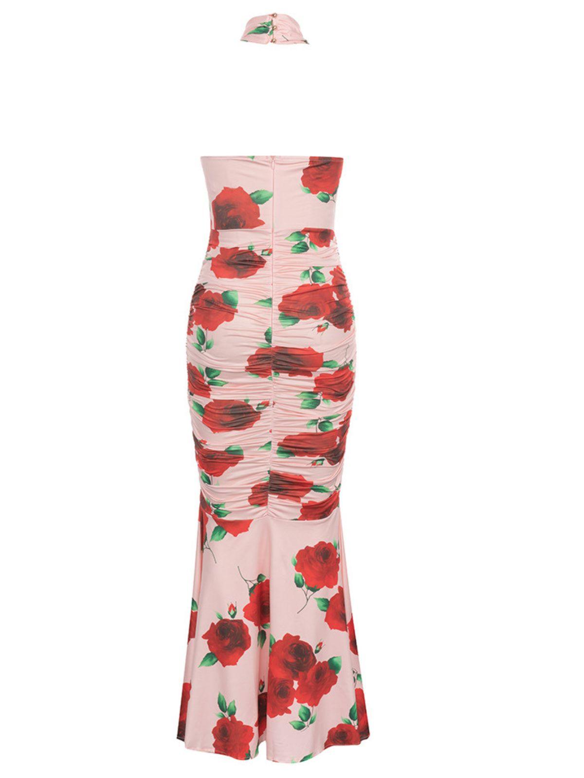 Charlotte Halterneck Rose Printed Maxi Dress featuring a floral design and elegant backless detail.