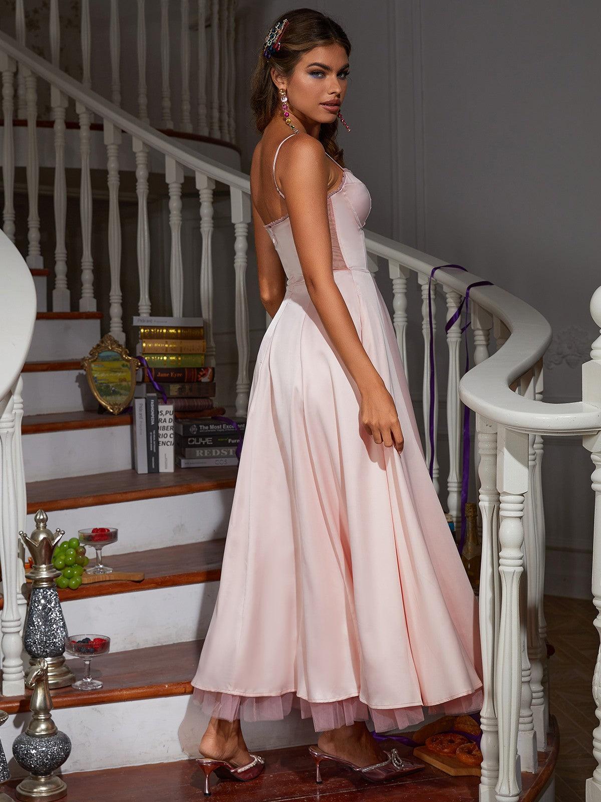 Abraxas Spaghetti Satin Dress in pink with sophisticated spaghetti straps and elegant patchwork design.