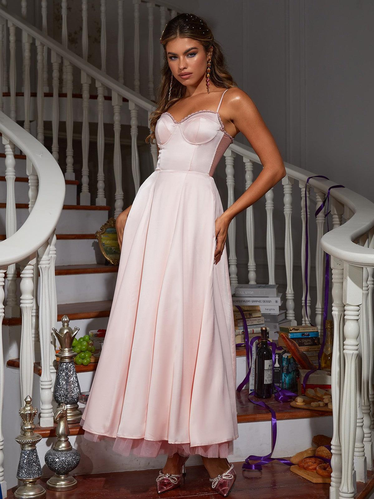 Abraxas Spaghetti Satin Dress in pink with sophisticated spaghetti straps and elegant patchwork design.