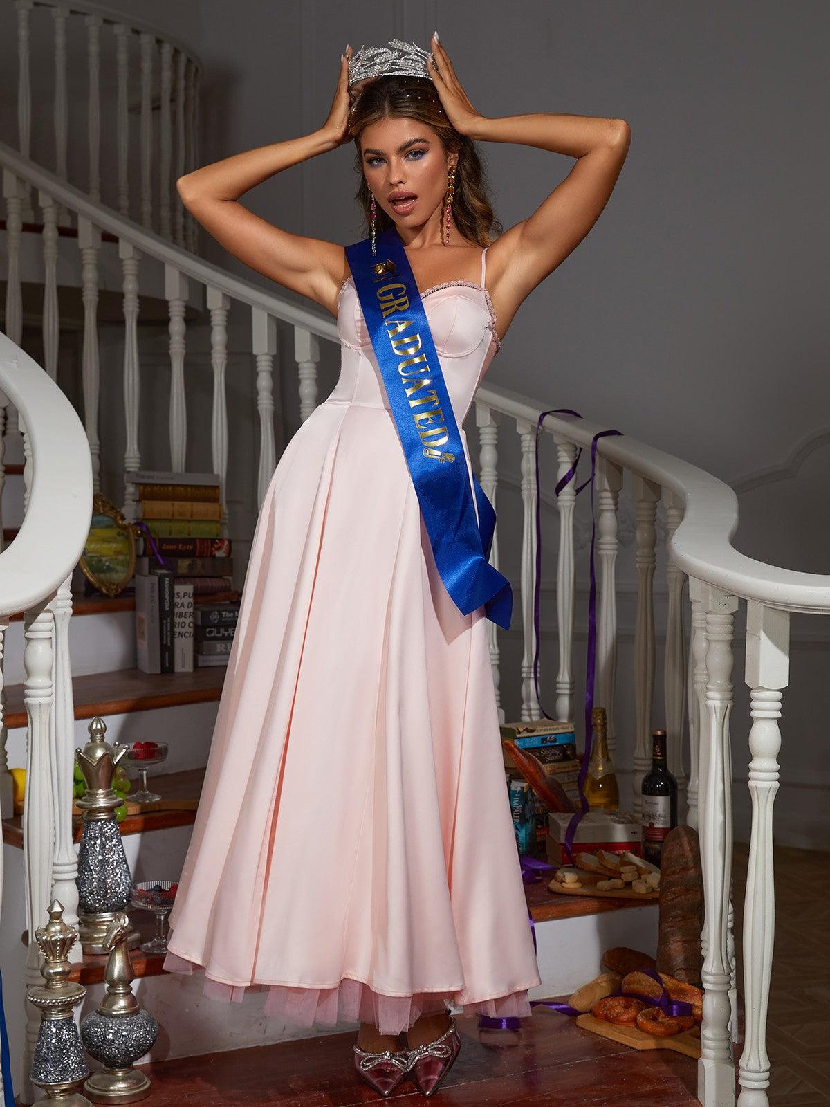 Model showcasing the elegant Abraxas Spaghetti Satin Dress during an evening event, highlighting its sophisticated style.