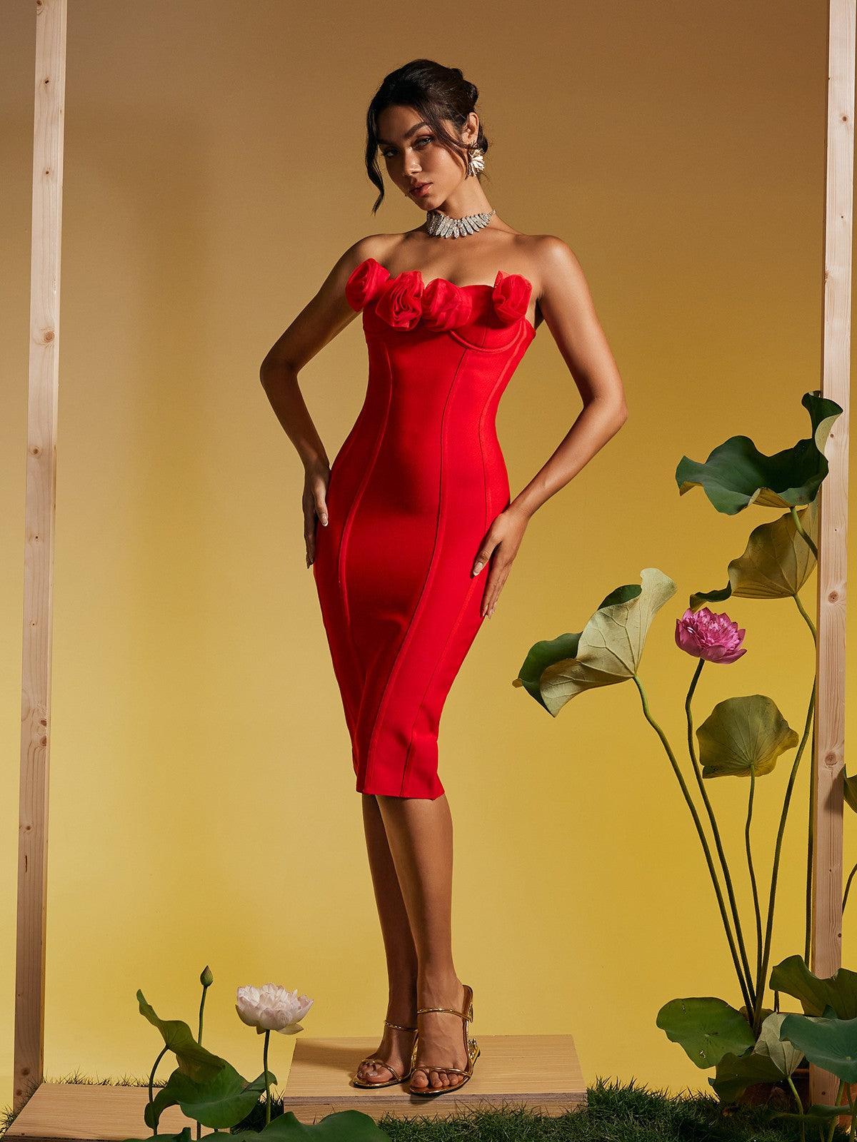 Close-up of the flower detailing on the Adlai Strapless Bandage Midi Dress, showcasing its elegant design and high-quality fabric.