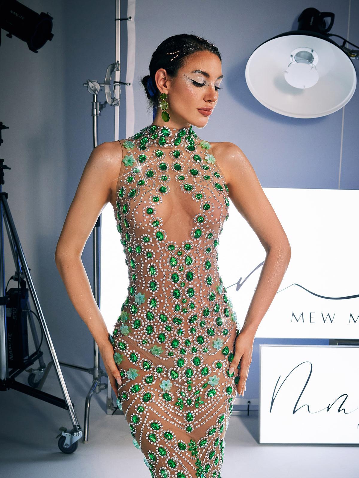 Model wearing the Ahava Rhinestone Embellished Maxi Dress at an elegant event, highlighting its stunning silhouette and style.