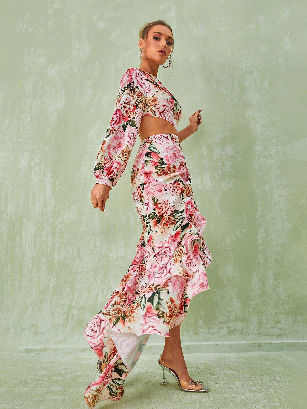 Close-up of the floral print and ruched detailing on the Aiyana one shoulder maxi dress in pink, highlighting its elegant style.
