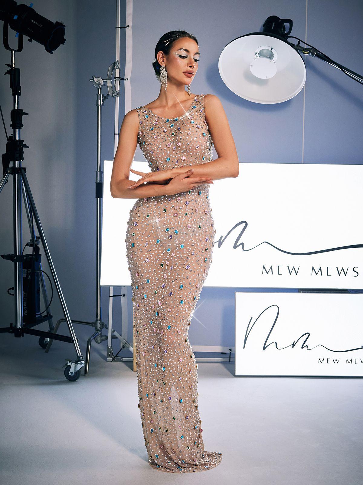 Close-up view of the rhinestone detailing on the Alfredo Maxi Dress, highlighting its luxurious embellishments.
