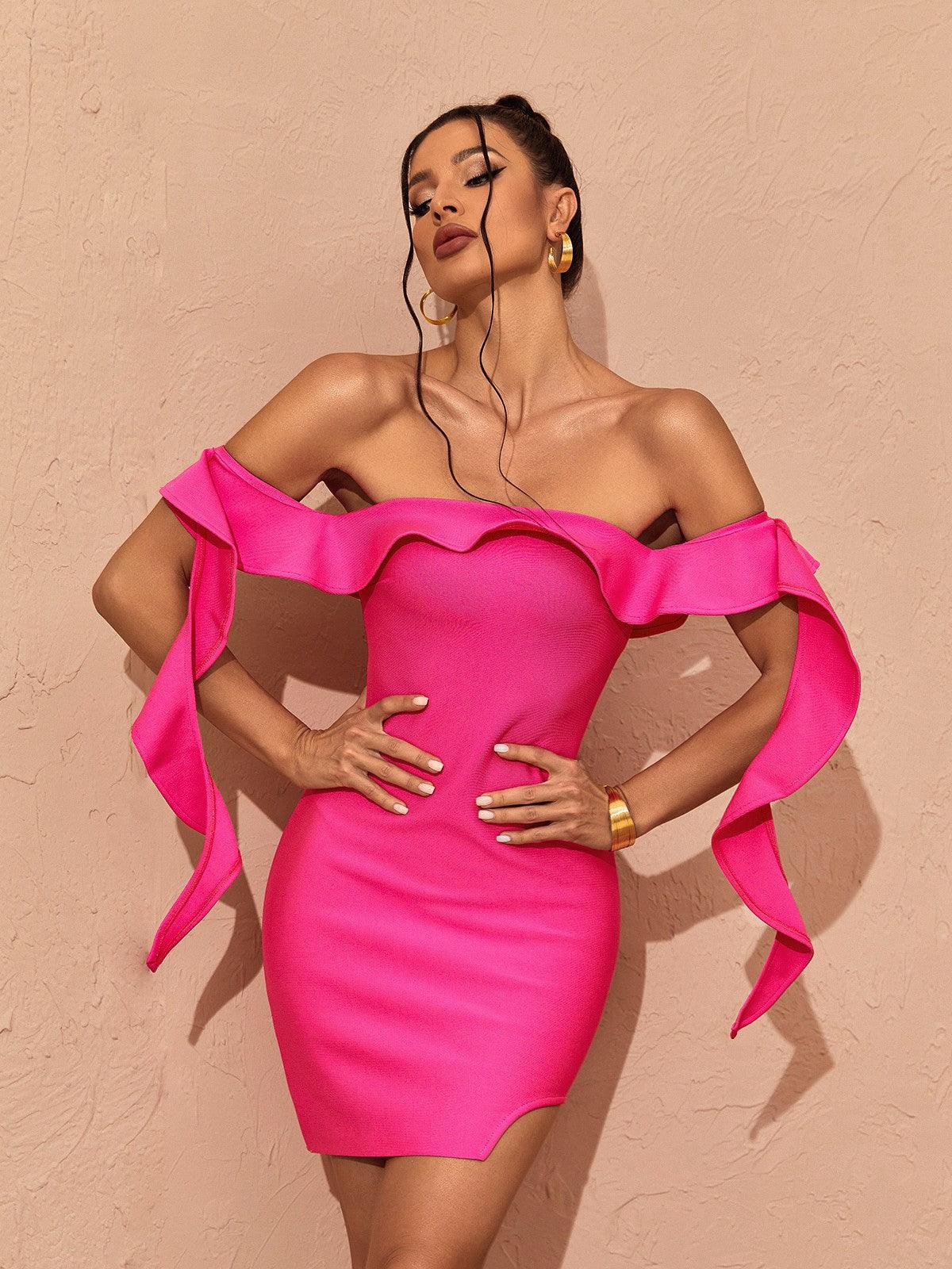 Close-up of the ruffle detailing on the Alivia off shoulder bandage dress in hot pink, perfect for adding a feminine touch.