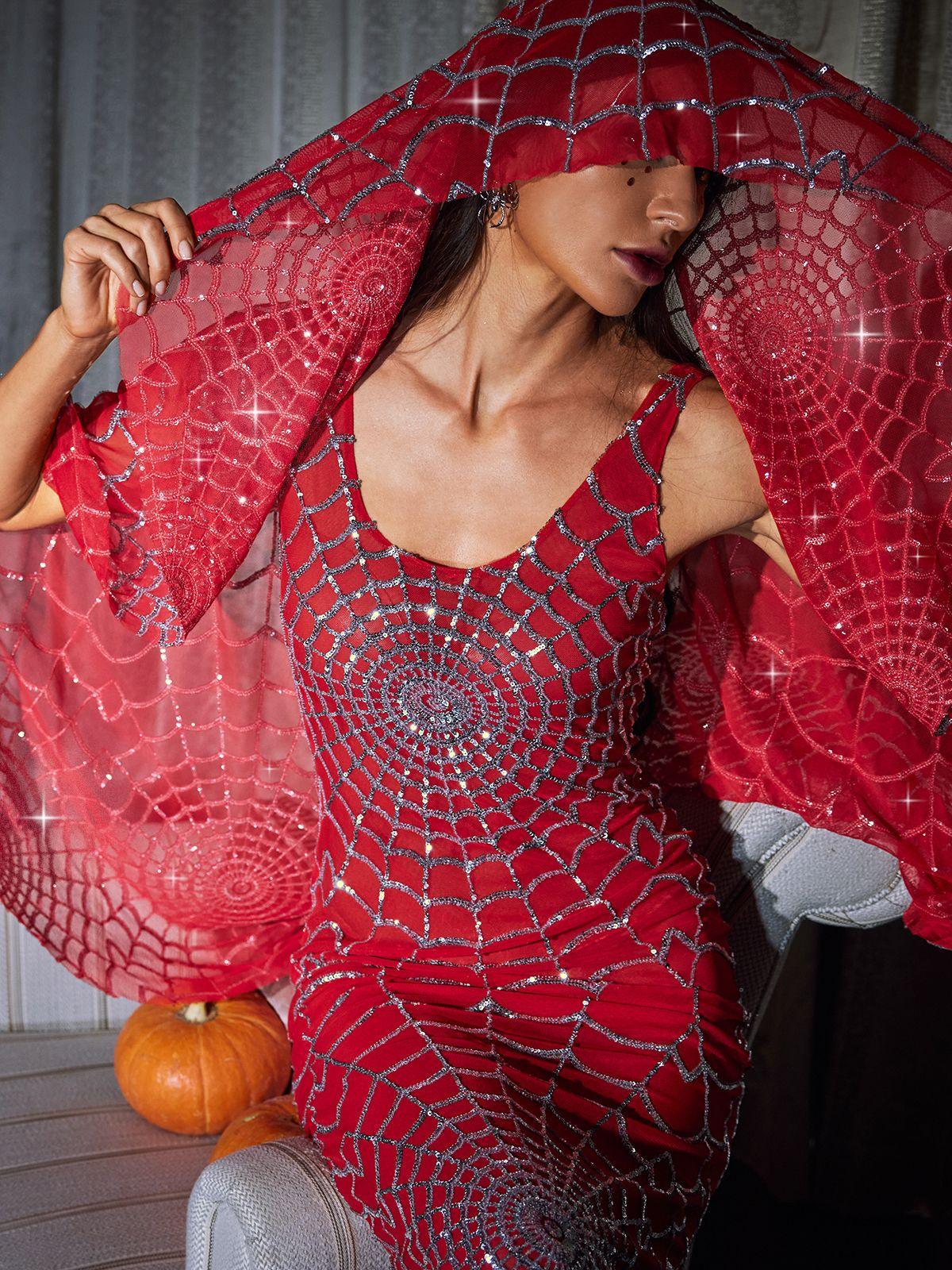 Calyx Cobweb Sequin Veil in striking red, featuring intricate sequins for a glamorous touch to any outfit.