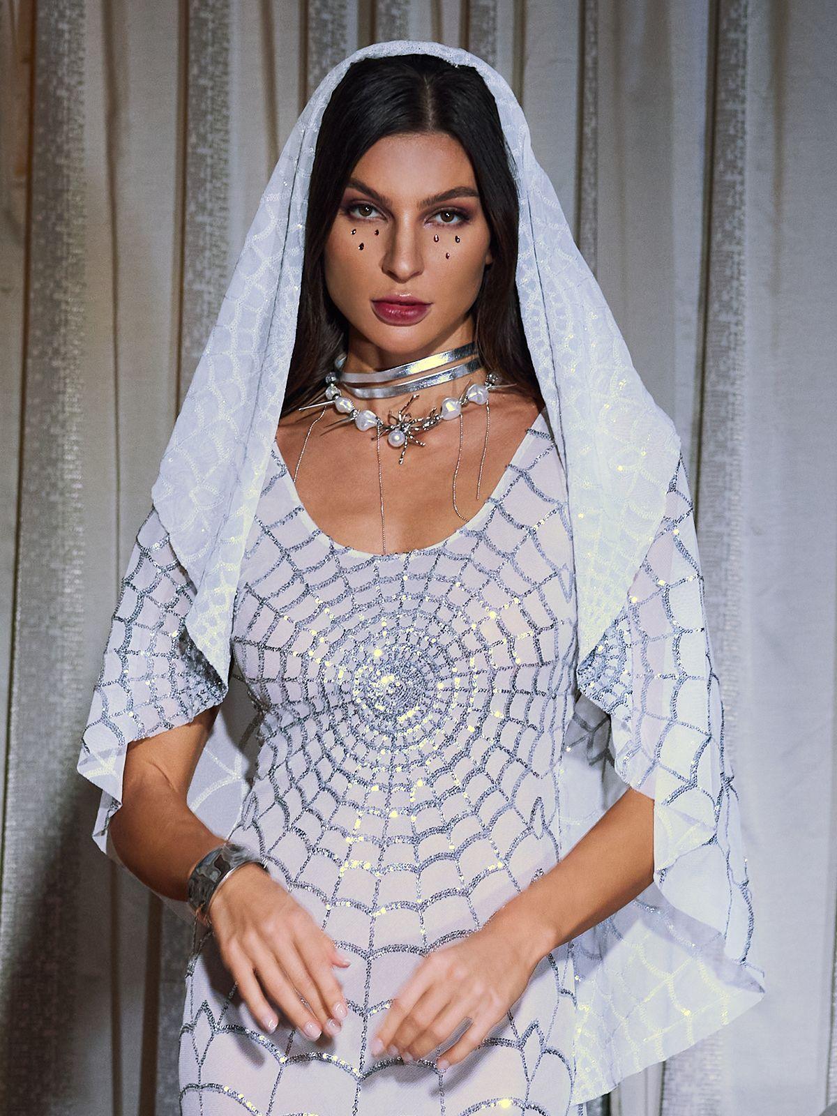 Close-up of the Calyx Cobweb Sequin Veil, highlighting the intricate cobweb design and sparkling sequins in white.