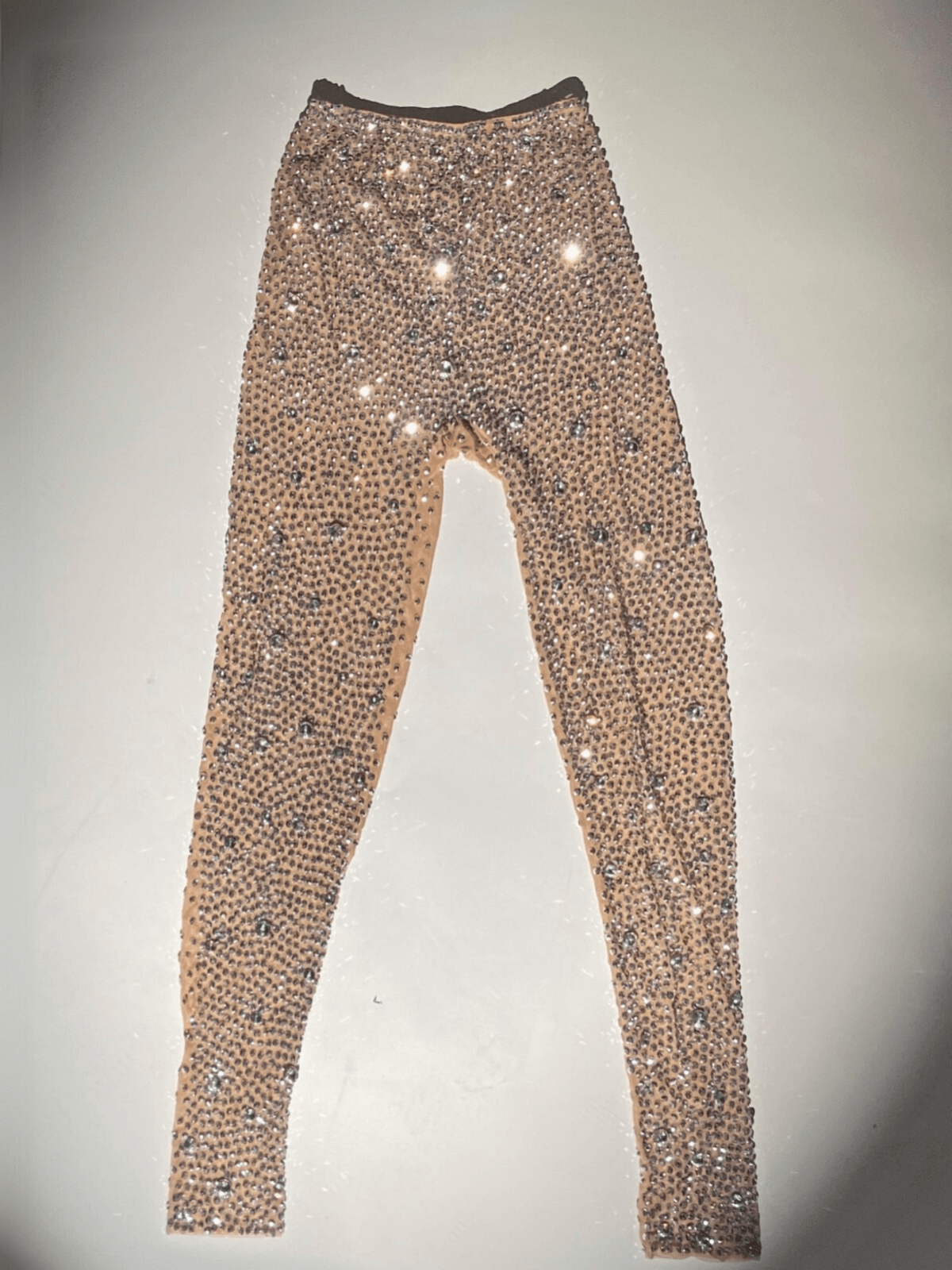 Ally Rhinestone Mesh Pants in Light Nude, showcasing sparkling rhinestones and elegant mesh fabric.