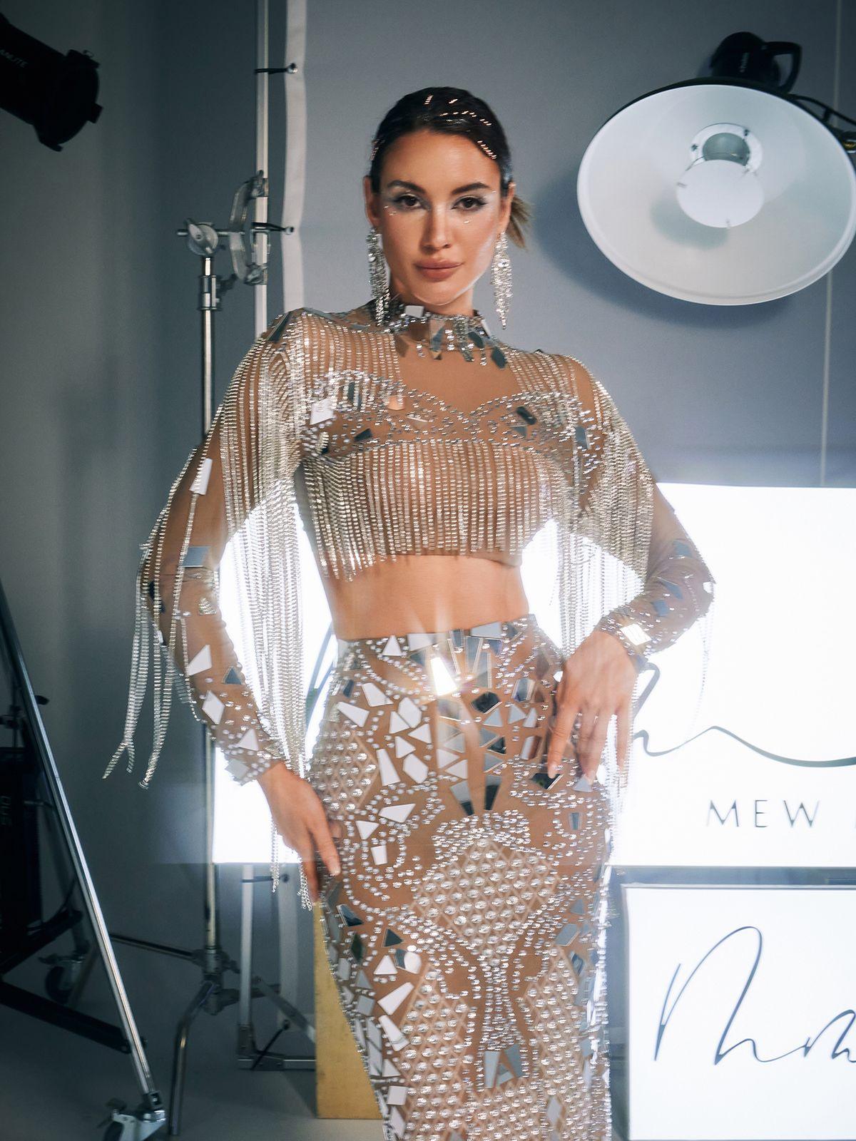 Flat lay of the Alvin Acrylic Fringe Skirt Set, showcasing its trendy design and slightly stretchy fabric.
