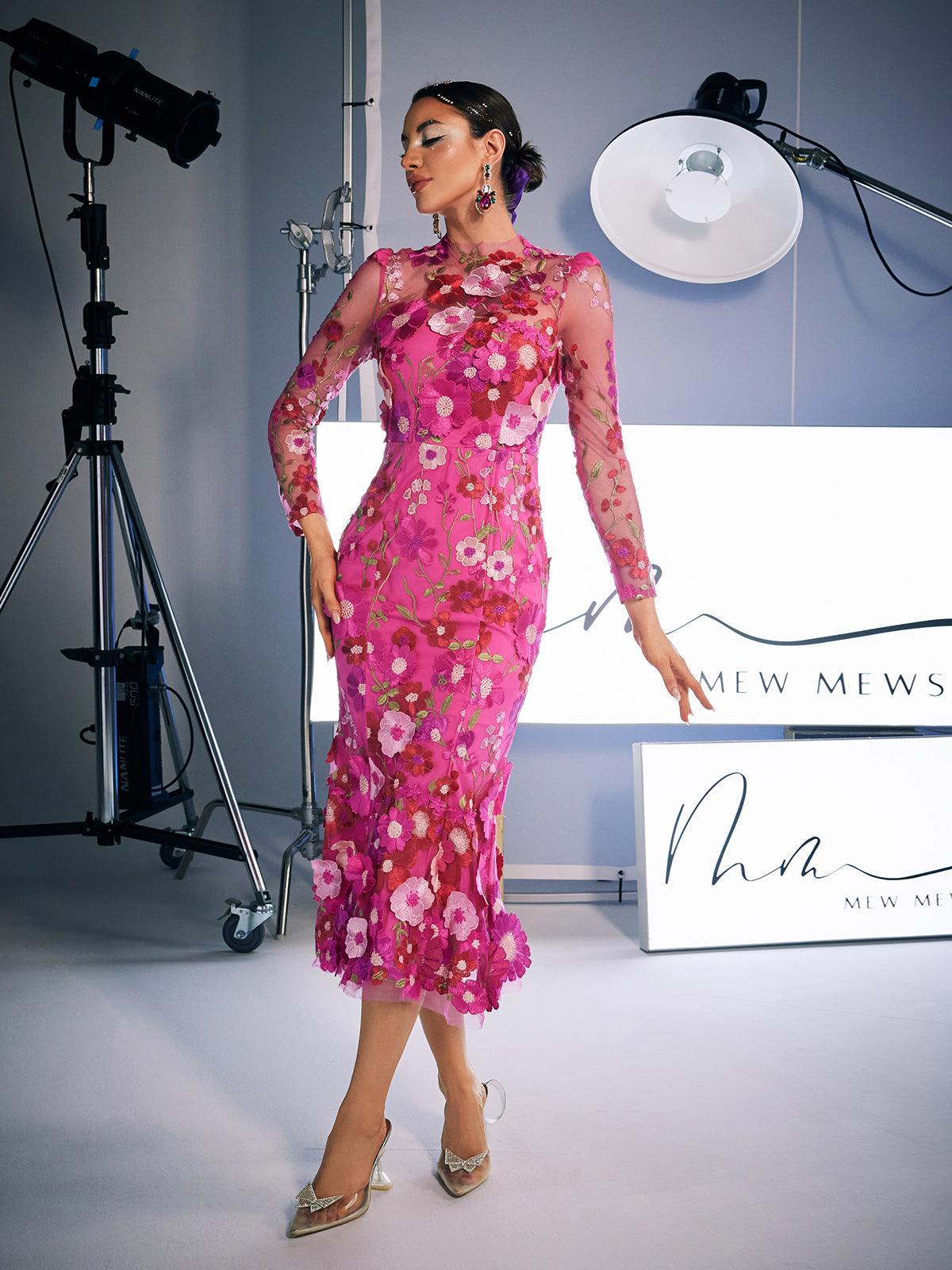 Amara Long Sleeve Embroidered Midi Dress in vibrant hot pink, showcasing elegant floral embroidery.