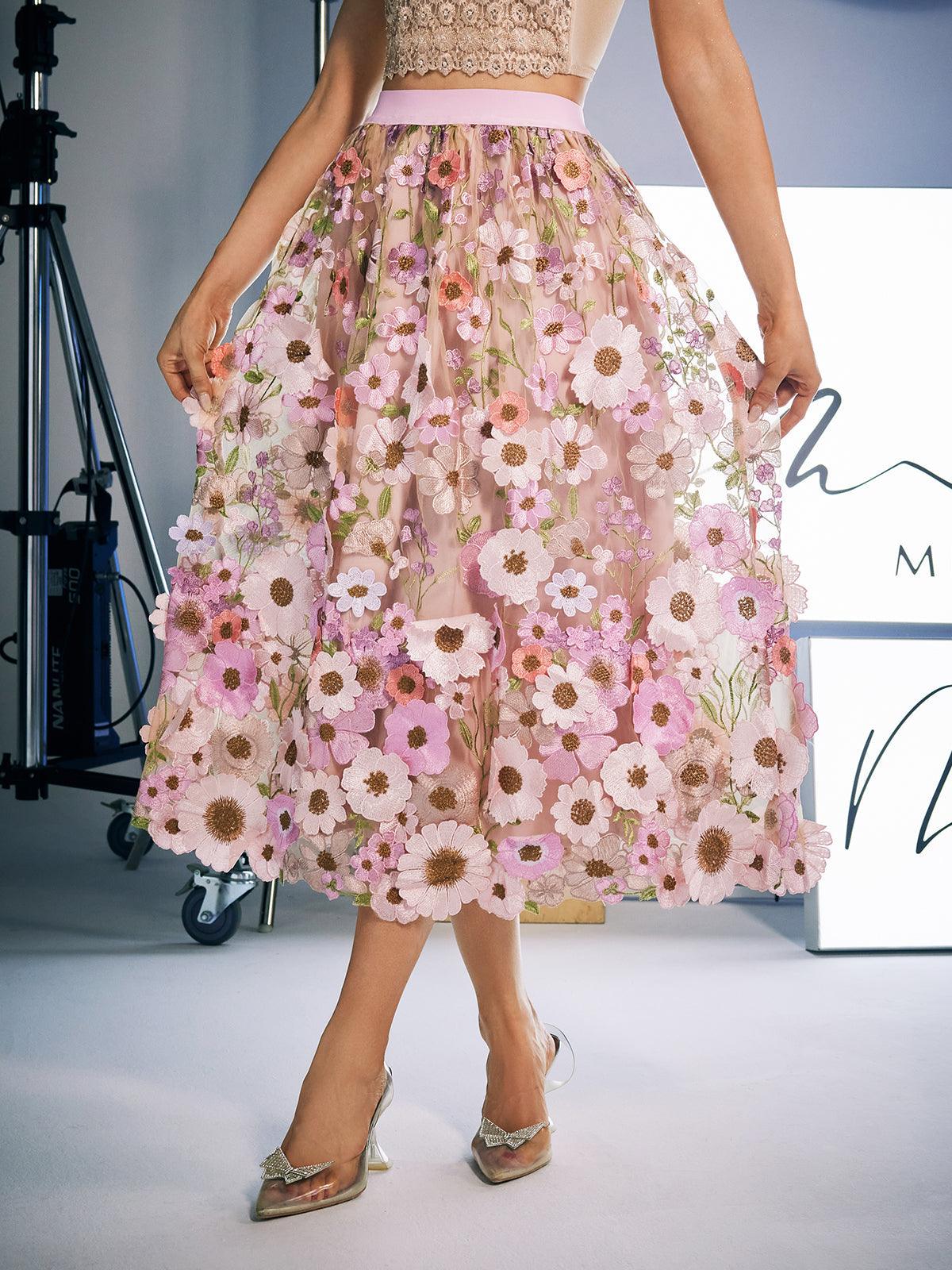 Amory Flower Embroidered Skirt in Pink featuring delicate floral designs, perfect for stylish outings and office wear.