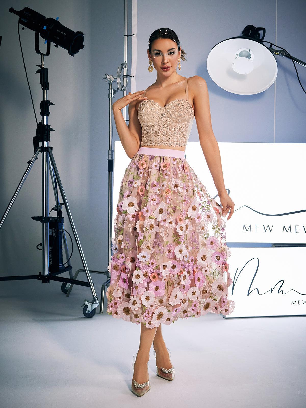 Amory Flower Embroidered Skirt in Pink featuring delicate floral designs, perfect for stylish outings and office wear.