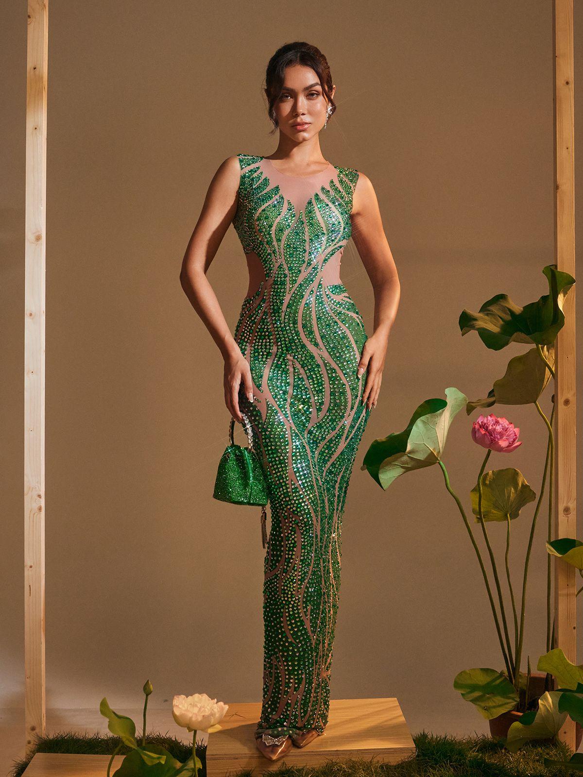 Close-up of the rhinestone detailing on the Anabia Maxi Dress, showcasing its luxurious design and vibrant colors.