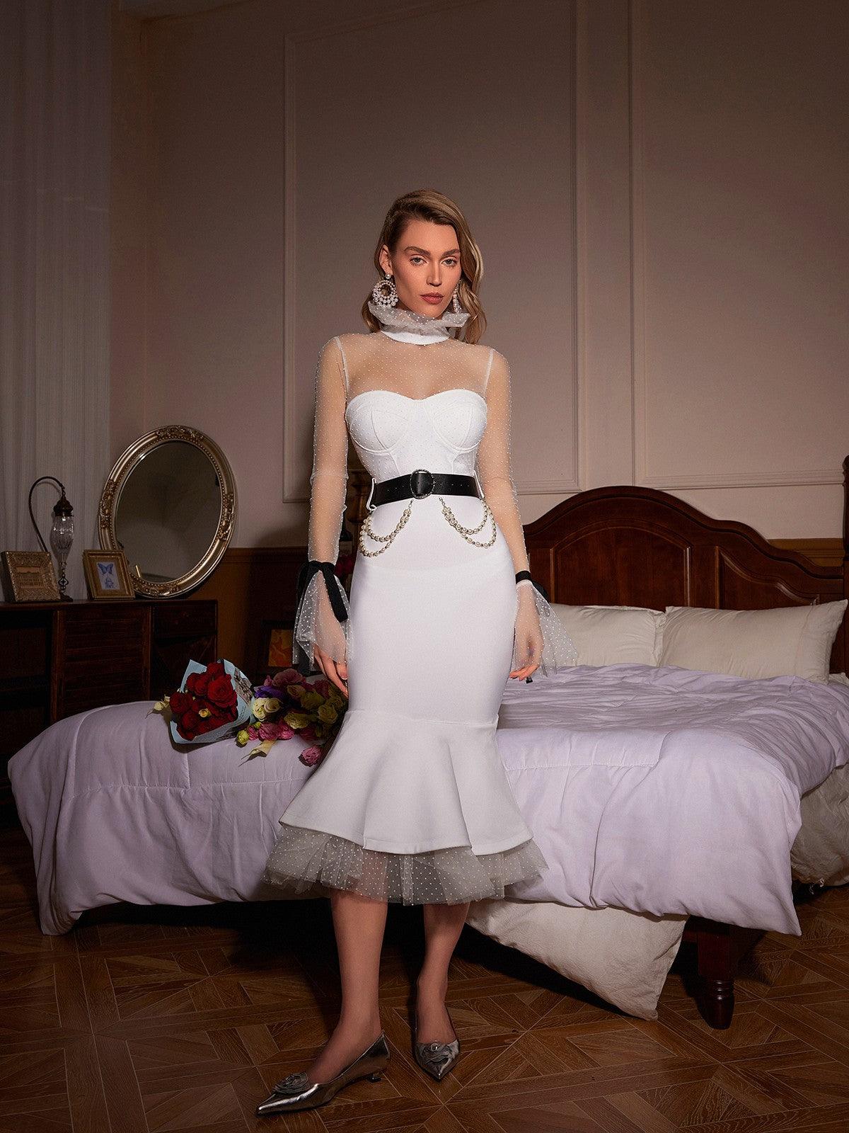 Andrieka Dot Mermaid Bandage Dress showcasing a chic patchwork design and elegant long sleeves in white.
