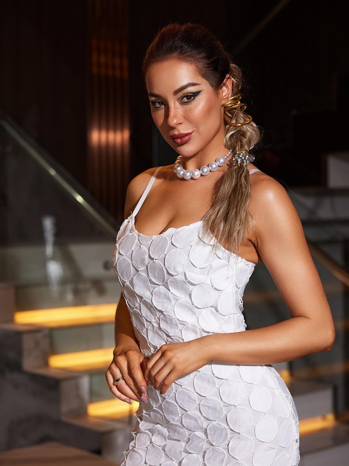 Annick Spaghetti Circle Cutout Midi Dress in white showcasing a stylish design, perfect for parties and special occasions.