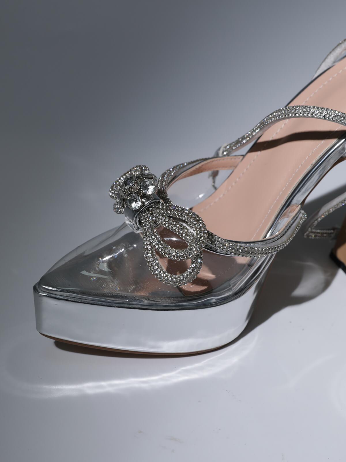 Anouk Bow Crystal Heels in Silver featuring a unique design with elegant bow and sparkling crystals for a chic look.