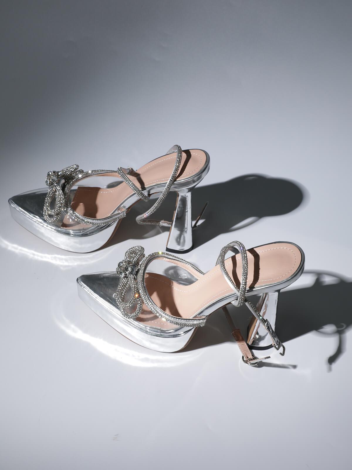 Anouk Bow Crystal Heels in Silver featuring a unique design with elegant bow and sparkling crystals for a chic look.