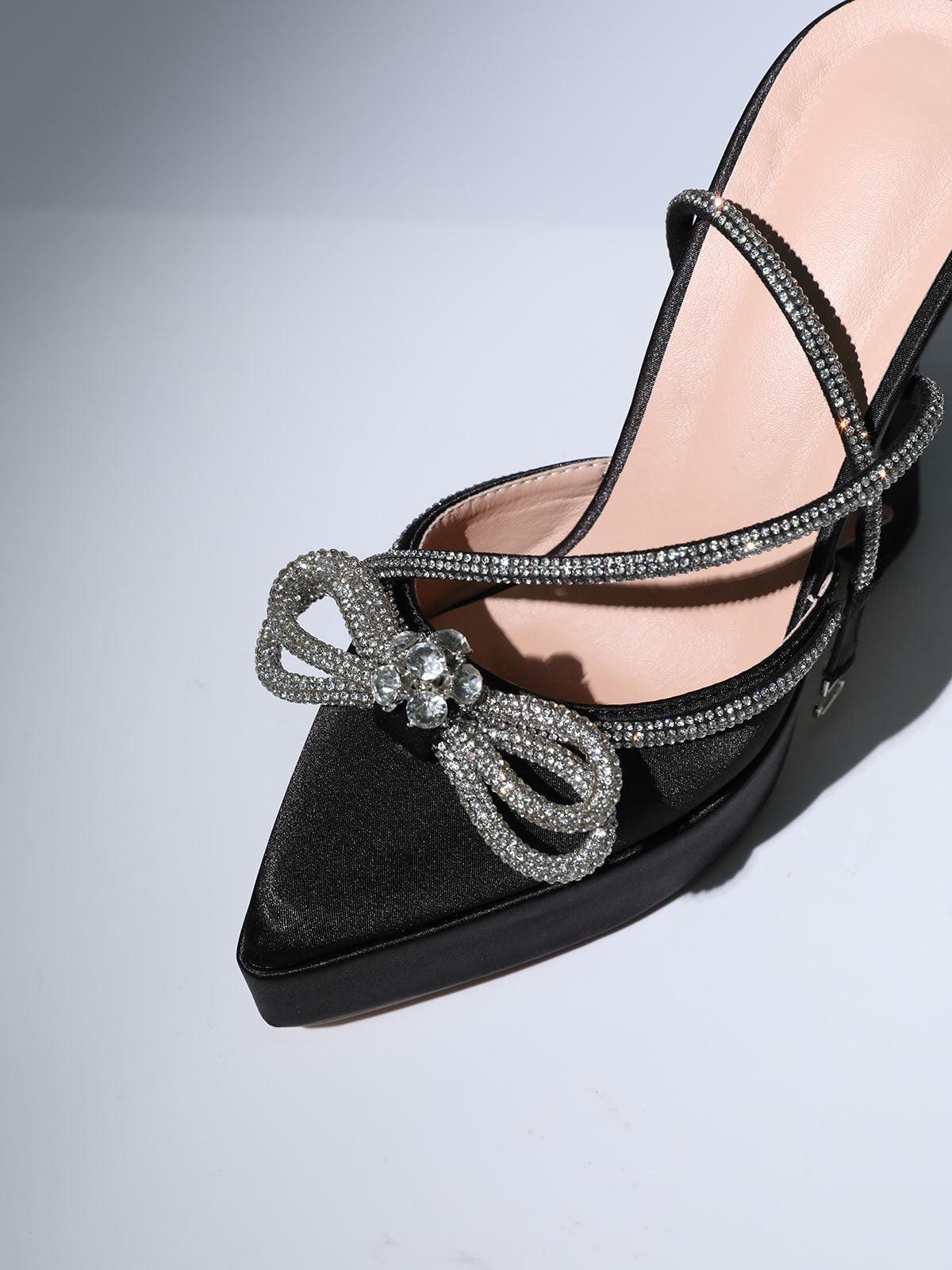 Anouk Bow Crystal Satin Heels in Black featuring elegant ankle strap and crystal embellishments.