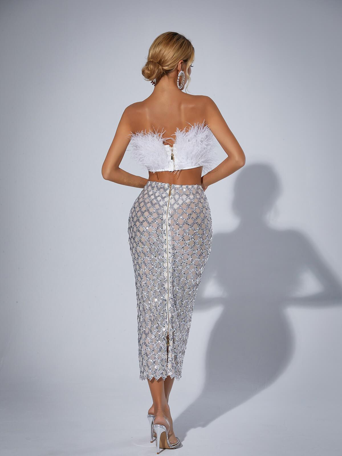 Back view of the Ansley Strapless Feather Mesh Skirt Set in White, highlighting its unique silhouette.
