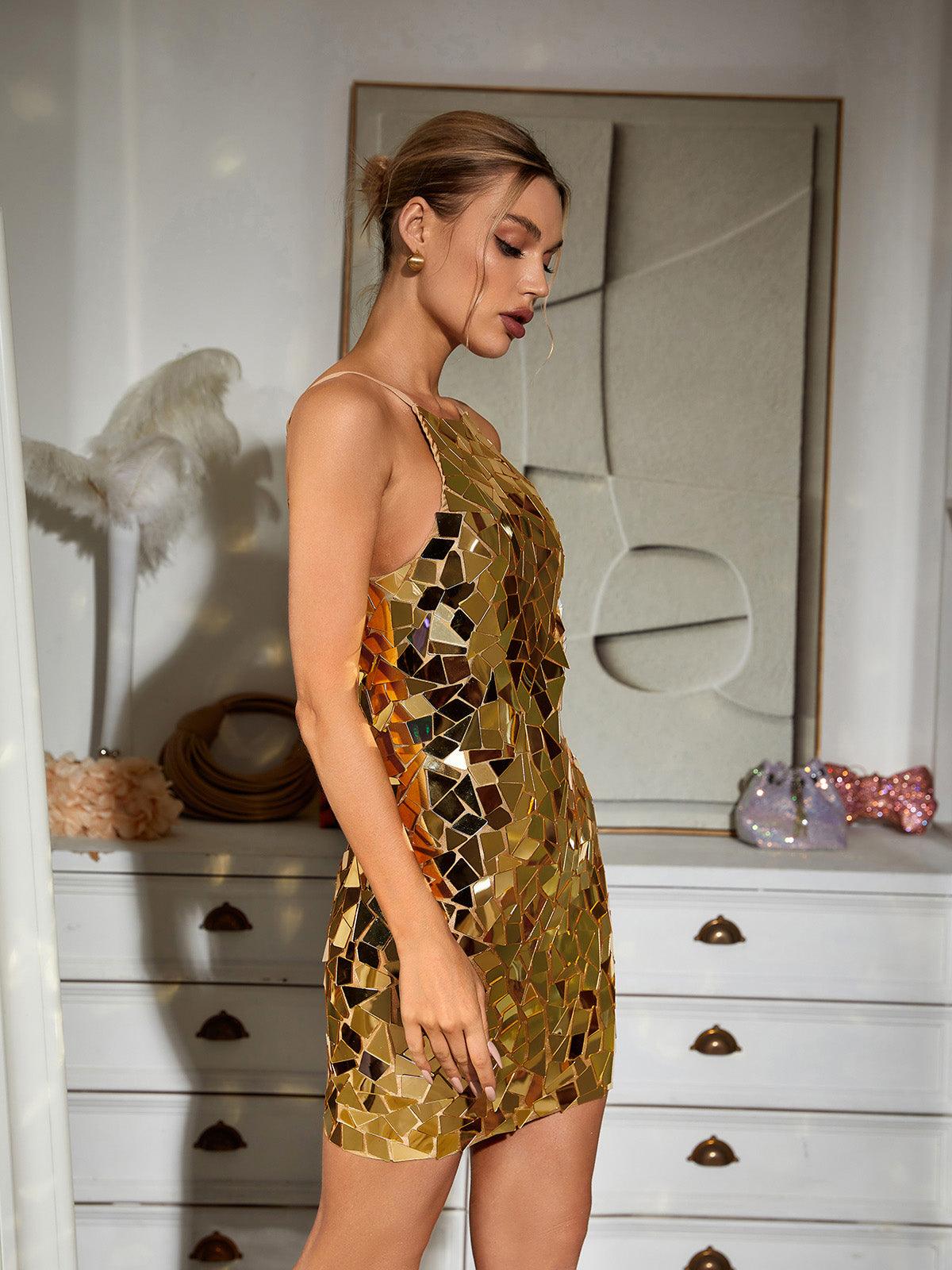 April Embellished Mini Dress in Gold featuring a halter neck and sparkly chainmail design, perfect for cocktail events.