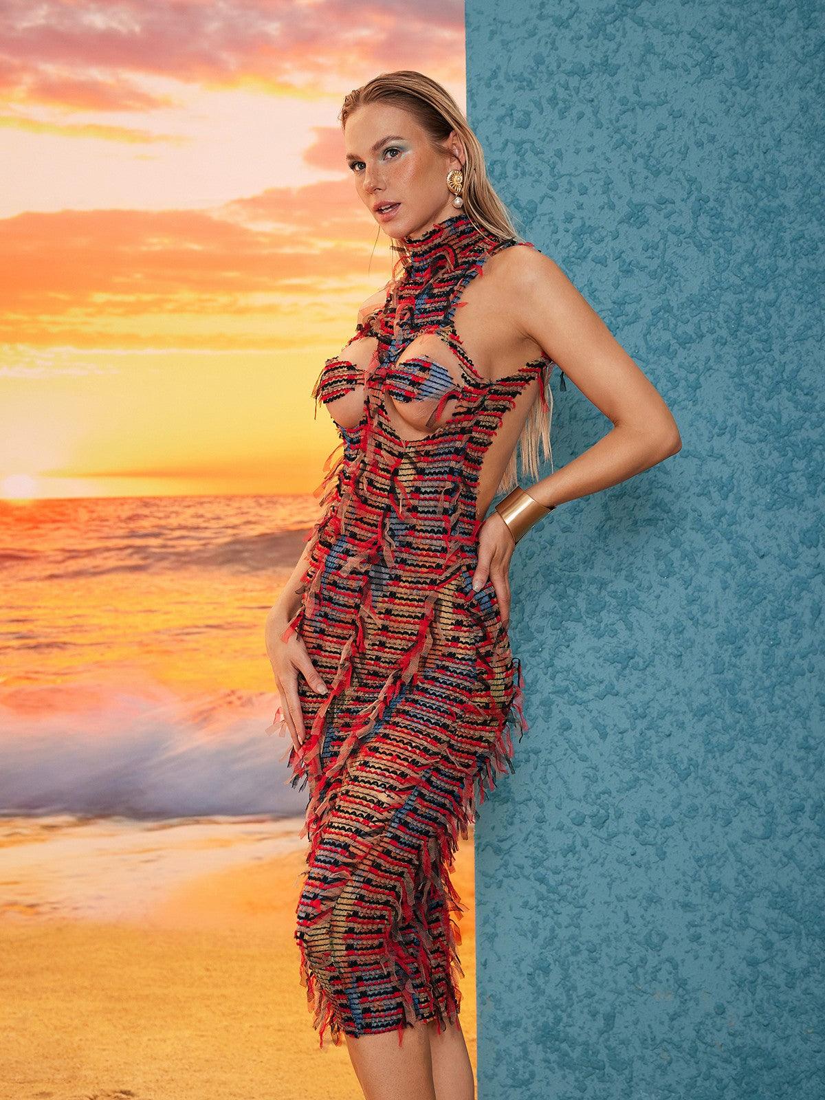 Detail of the backless design of the Arlo Backless Cutout Midi Dress, emphasizing its chic cutout features and stylish midi length.