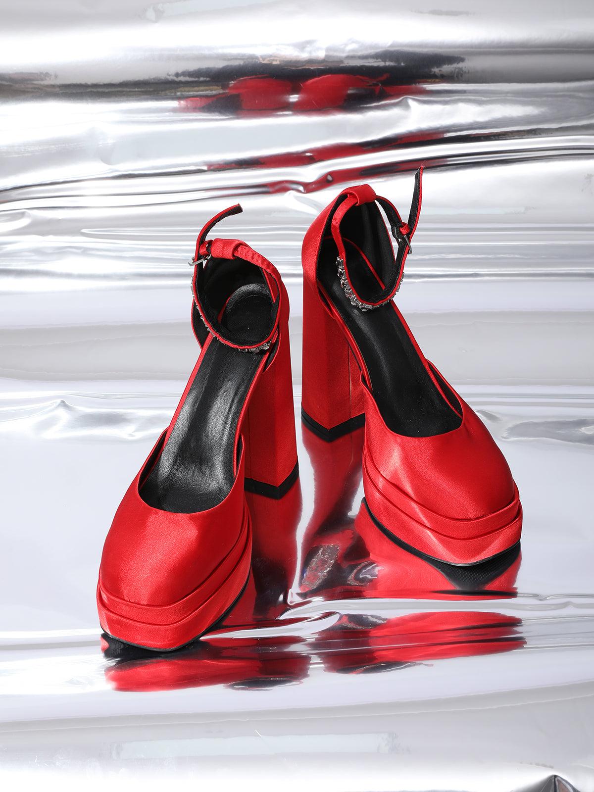 Model wearing Aspen Satin Platform Pumps, demonstrating their versatility for various fashion occasions.