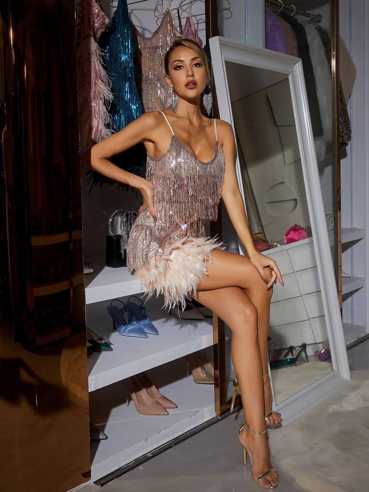 Austyn Tassel Feather Mini Dress in Champagne featuring elegant tassels and embellishments, perfect for cocktail events.