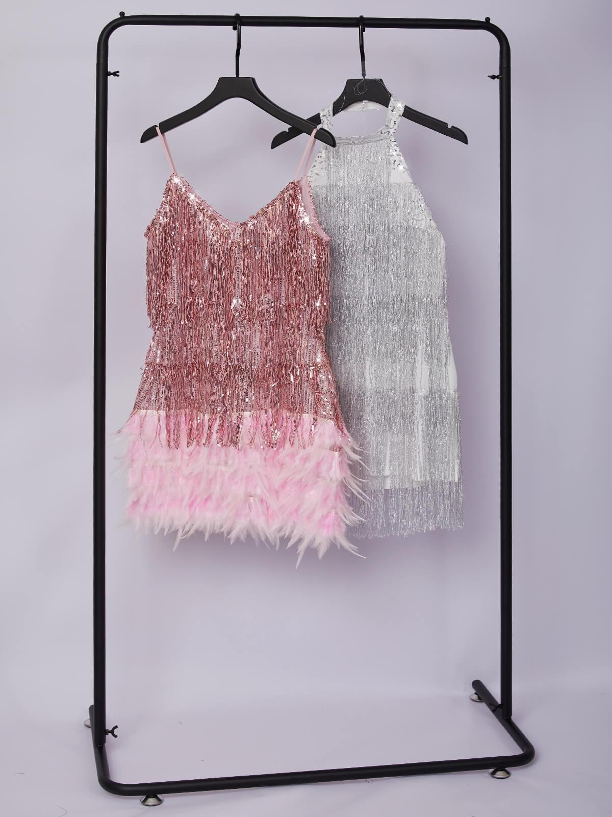 Austyn Tassel Feather Mini Dress in Pink featuring fringe and hand embellishments for a glamorous party look.