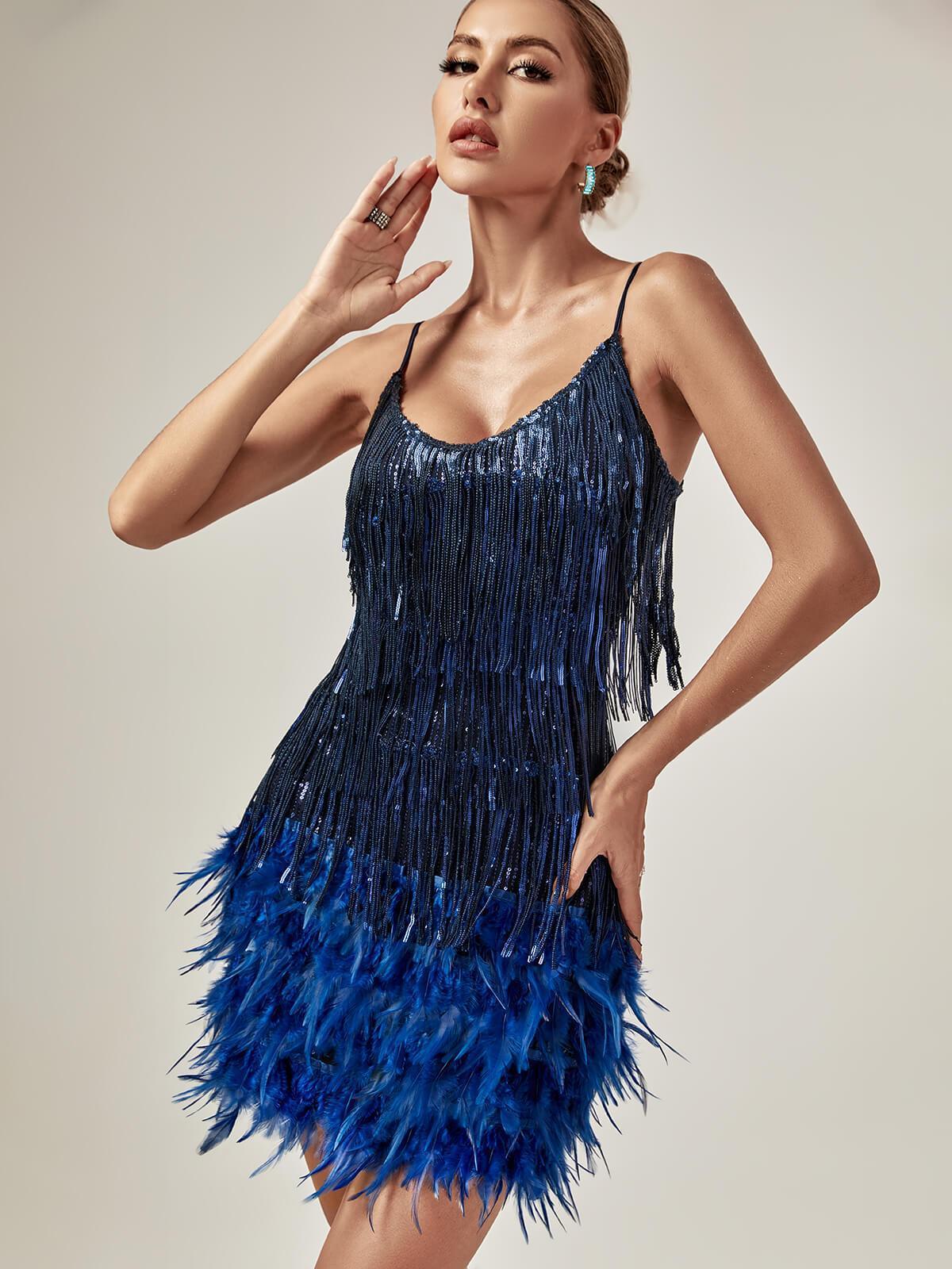 Model wearing the Austyn Tassel Feather Mini Dress in royal blue, demonstrating its perfect fit and stylish design.