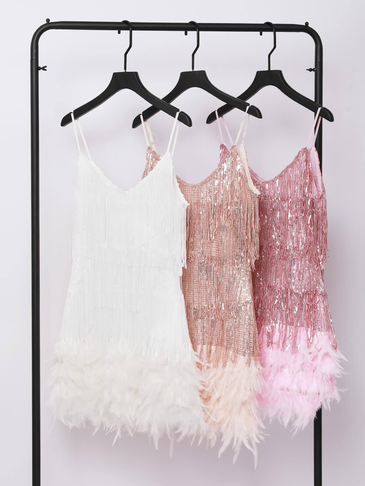 Austyn Tassel Feather Mini Dress in Champagne featuring elegant tassels and embellishments, perfect for cocktail events.