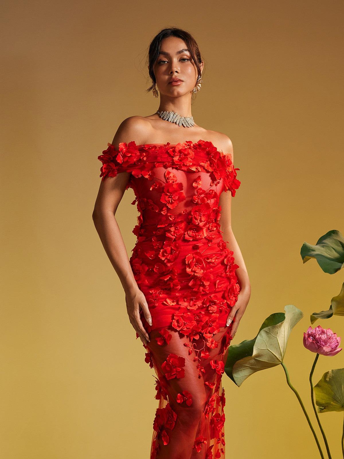 Close-up view of the Azizi Off Shoulder Flower Mesh Maxi Dress, highlighting the intricate floral mesh design and elegant silhouette.