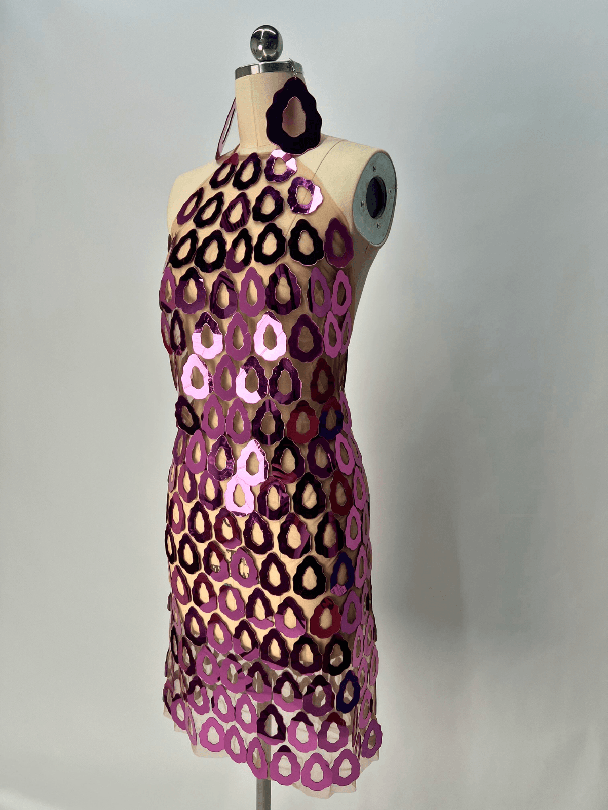 Badel Halterneck Acrylic Mesh Mini Dress in pink, featuring a stylish design for parties and festivals.