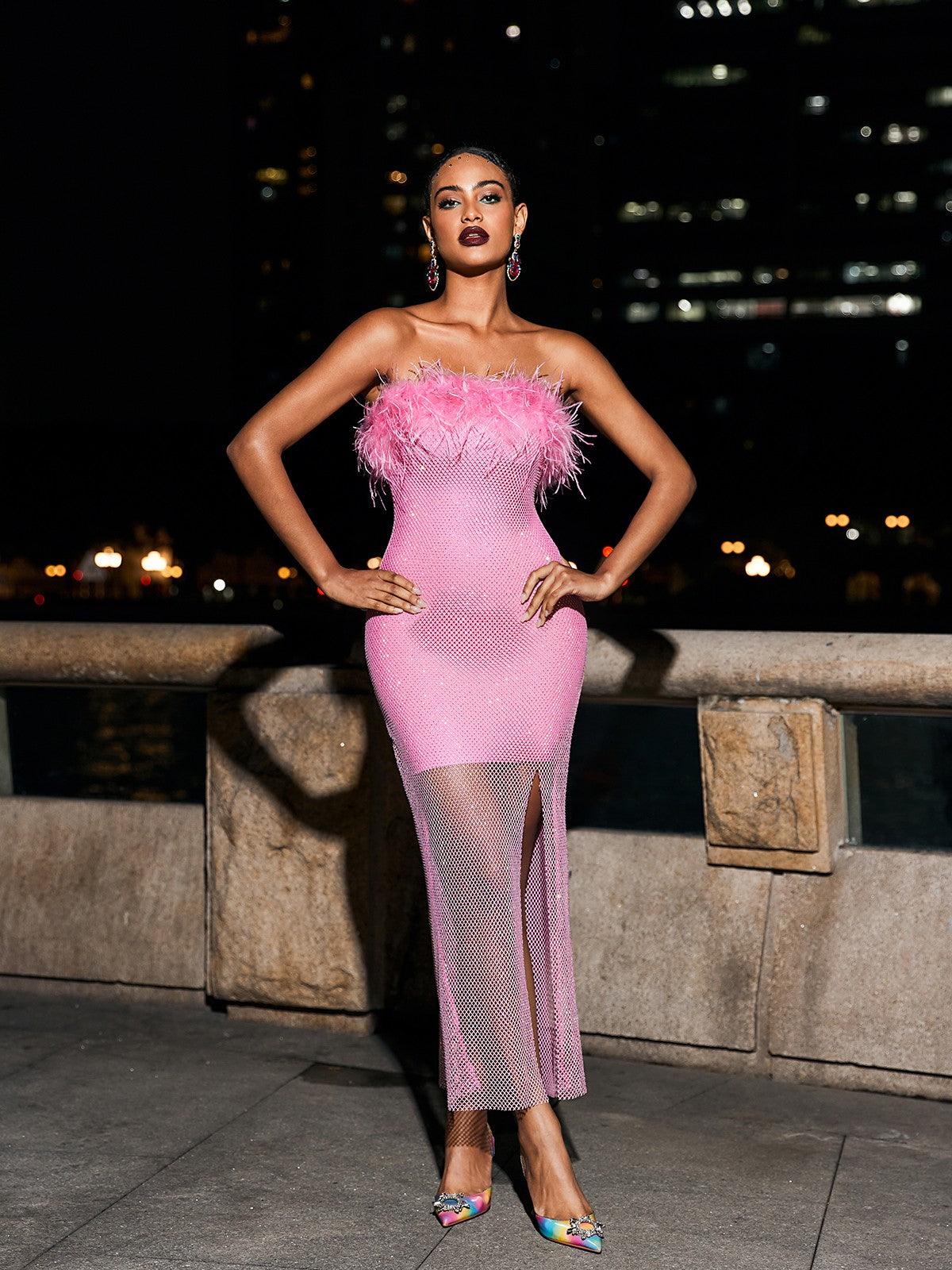 Barbie Mesh Rhinestone Maxi Bandage Dress in Hot Pink, showcasing its glamorous design and figure-flattering silhouette.