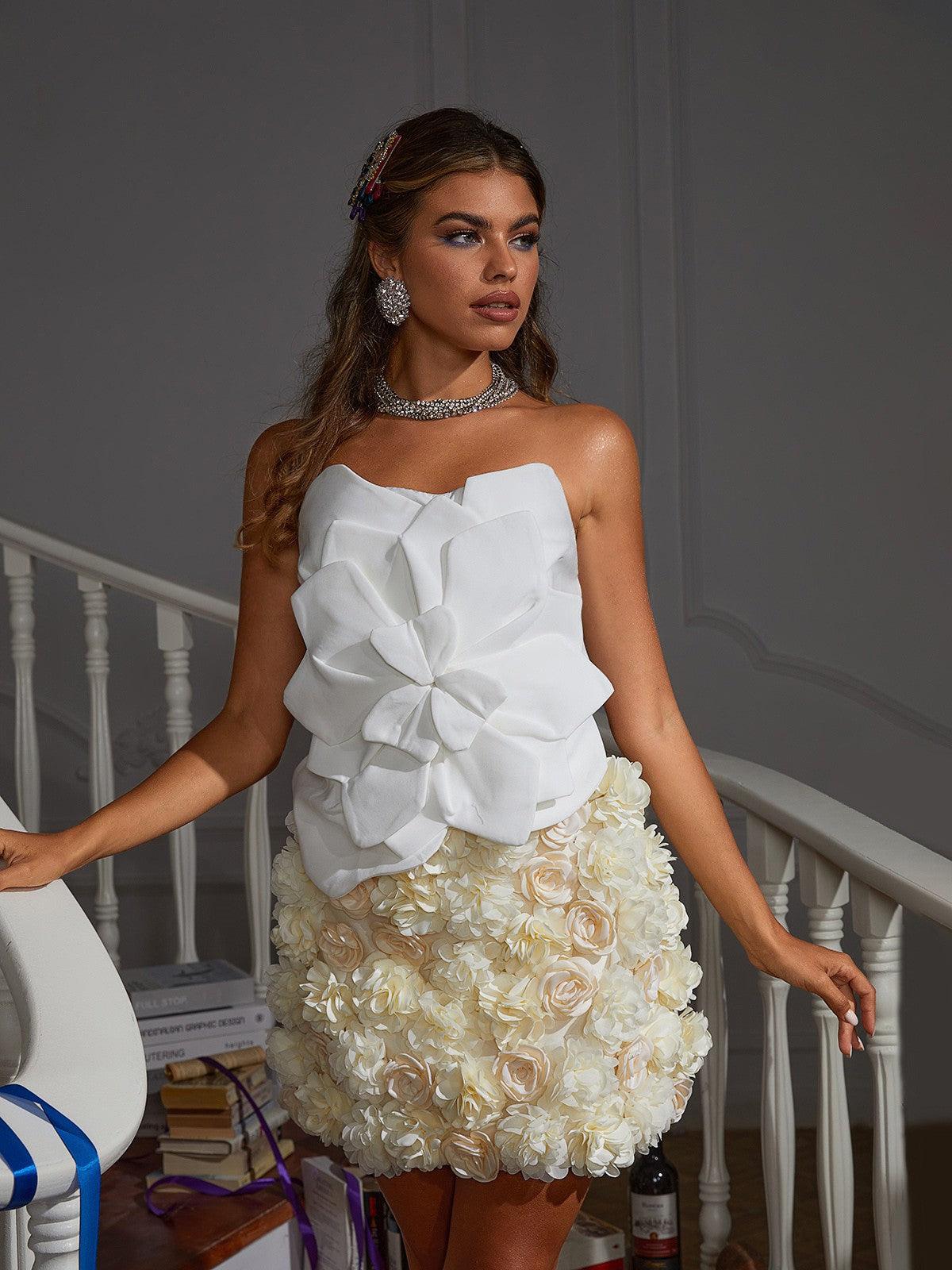 Close-up of the flower design on the Bayard Strapless Top highlighting its unique and stylish details.