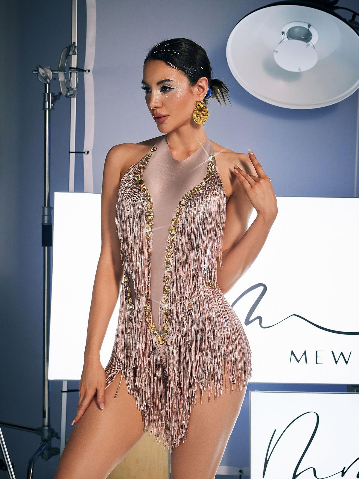 Model showcasing the Benicio Halterneck Fringe Sequin Bodysuit at a festival, embodying a fun and vibrant style.