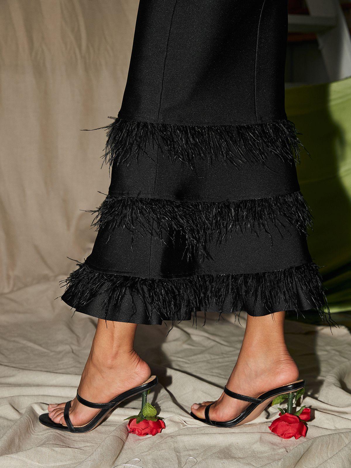 Bergenia Rose Heels in Black featuring a chic round toe design and elegant silhouette, perfect for special occasions and everyday wear.