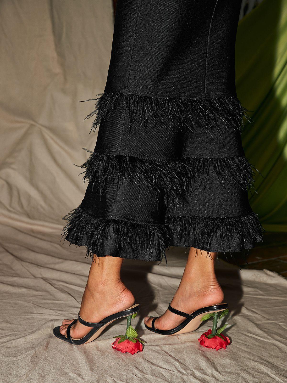Bergenia Rose Heels in Black featuring a chic round toe design and elegant silhouette, perfect for special occasions and everyday wear.