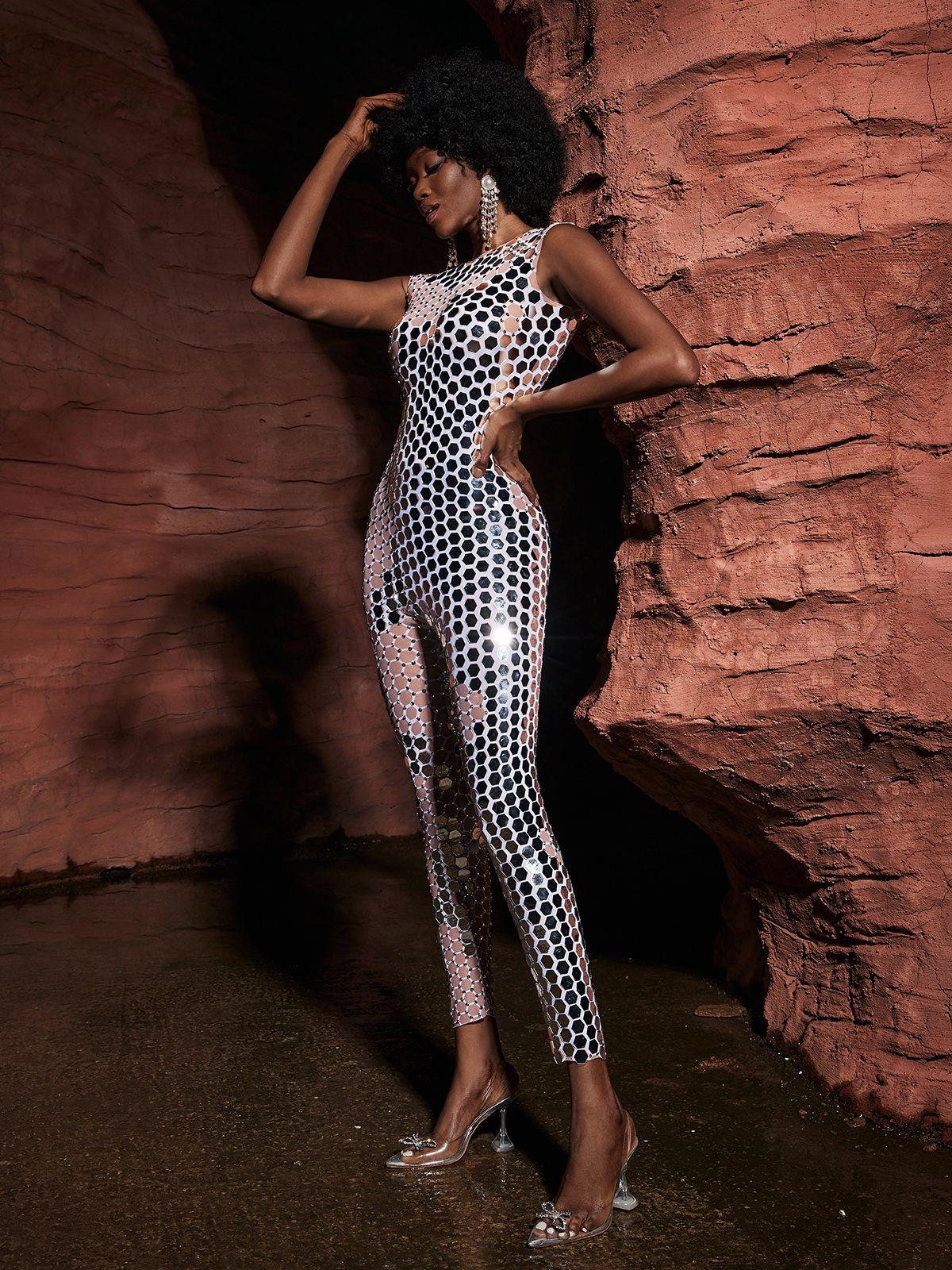 Close-up view of the acrylic embellishments on the Brecken jumpsuit, showcasing its exquisite design details.