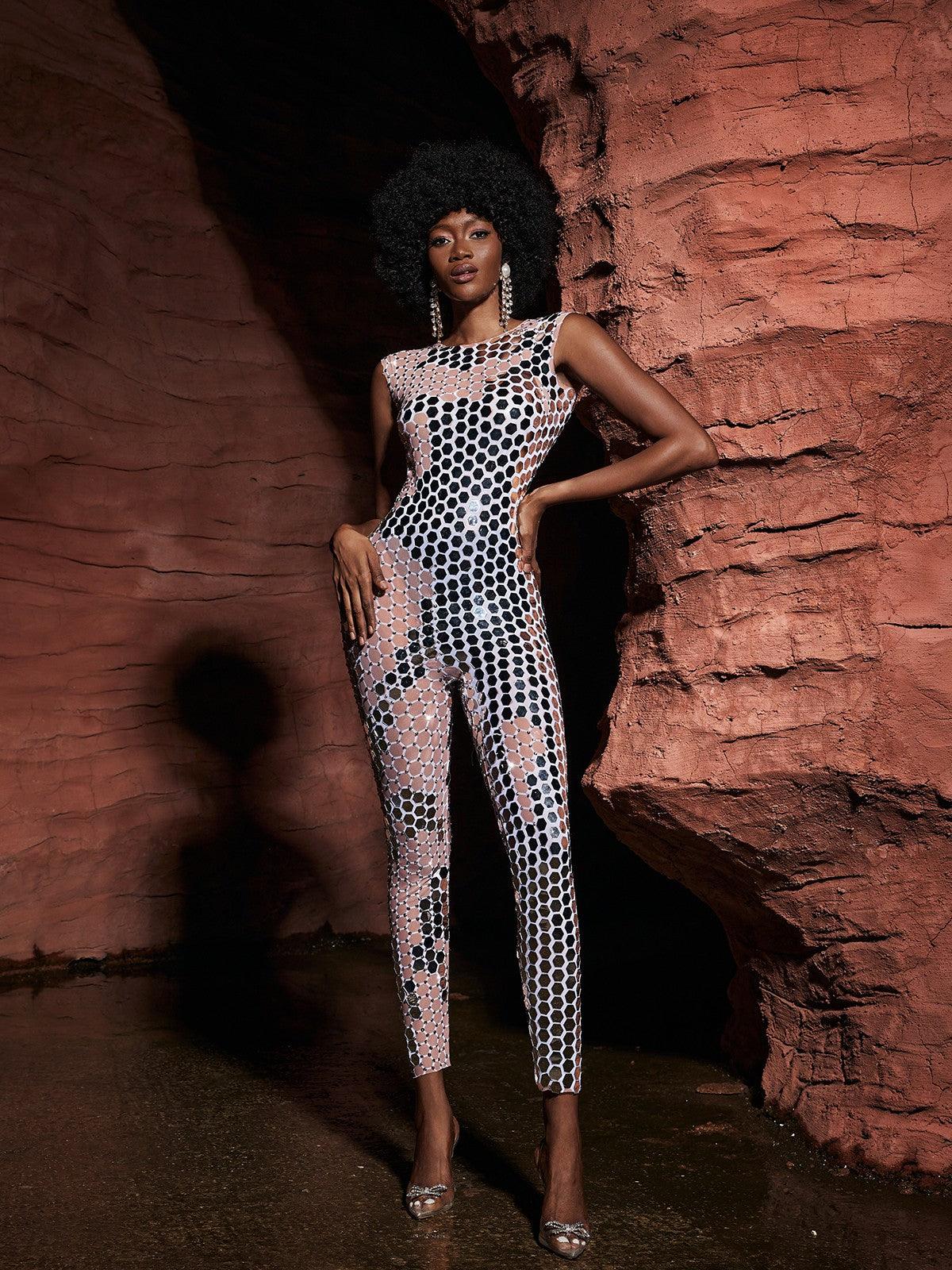 Back view of the Brecken jumpsuit highlighting the invisible zipper and sleek silhouette for a perfect fit.