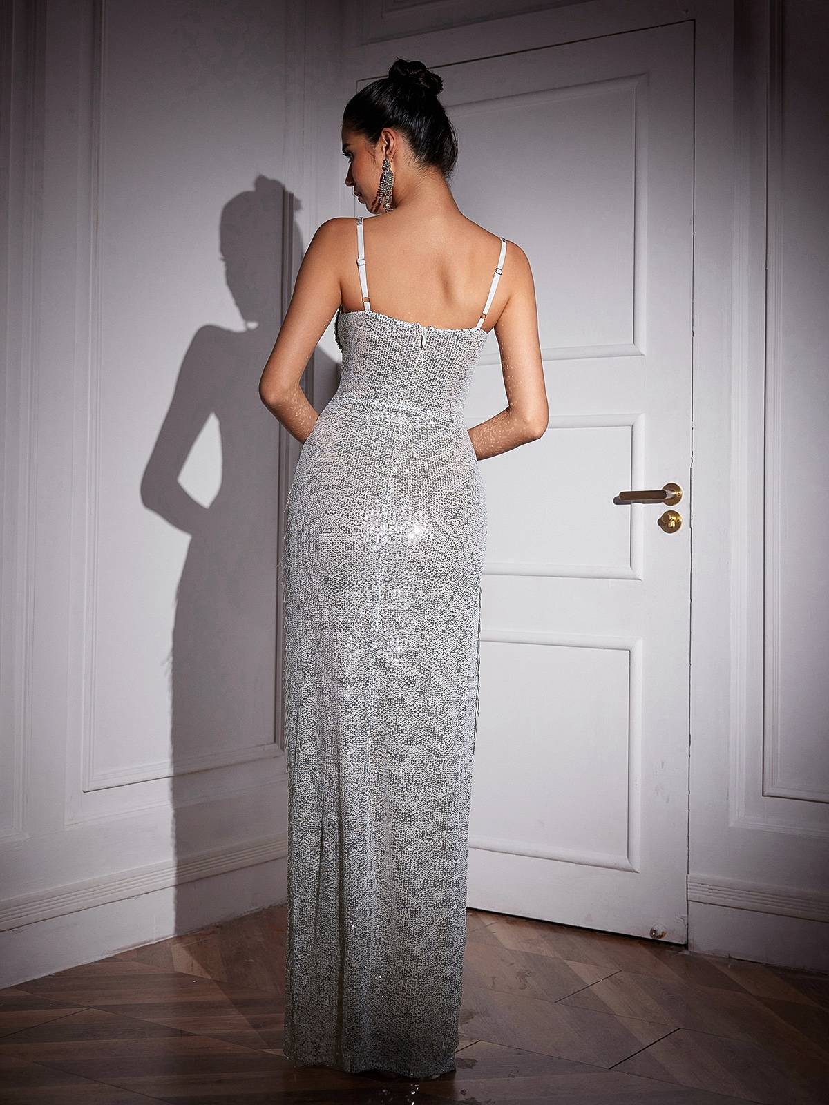 Brigid Spaghetti Crystal Fringe Sequin Maxi Dress featuring elegant crystal details and a glamorous flowy silhouette.