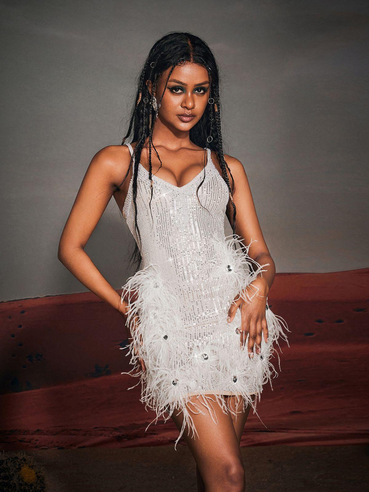 Bronte Pearl Sequin Feather Mini Dress with elegant sequin and feather details, perfect for cocktail and evening occasions.