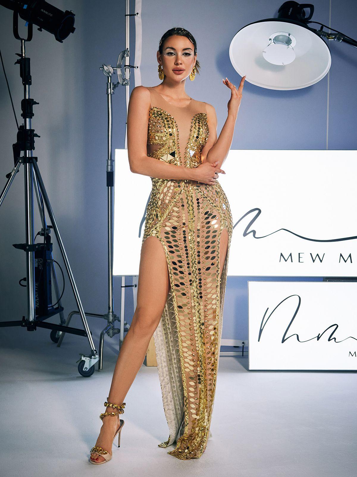 Back view of the Brycen Scoop Neck Maxi Dress, emphasizing its elegant design and high-quality acrylic material.