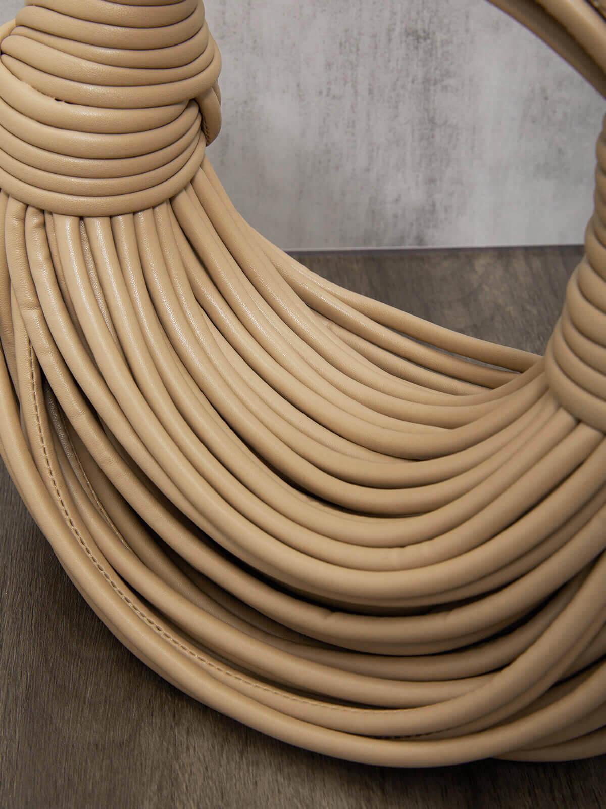 Camila Double Knot Tote Bag in Apricot, a stylish accessory for any outfit.
