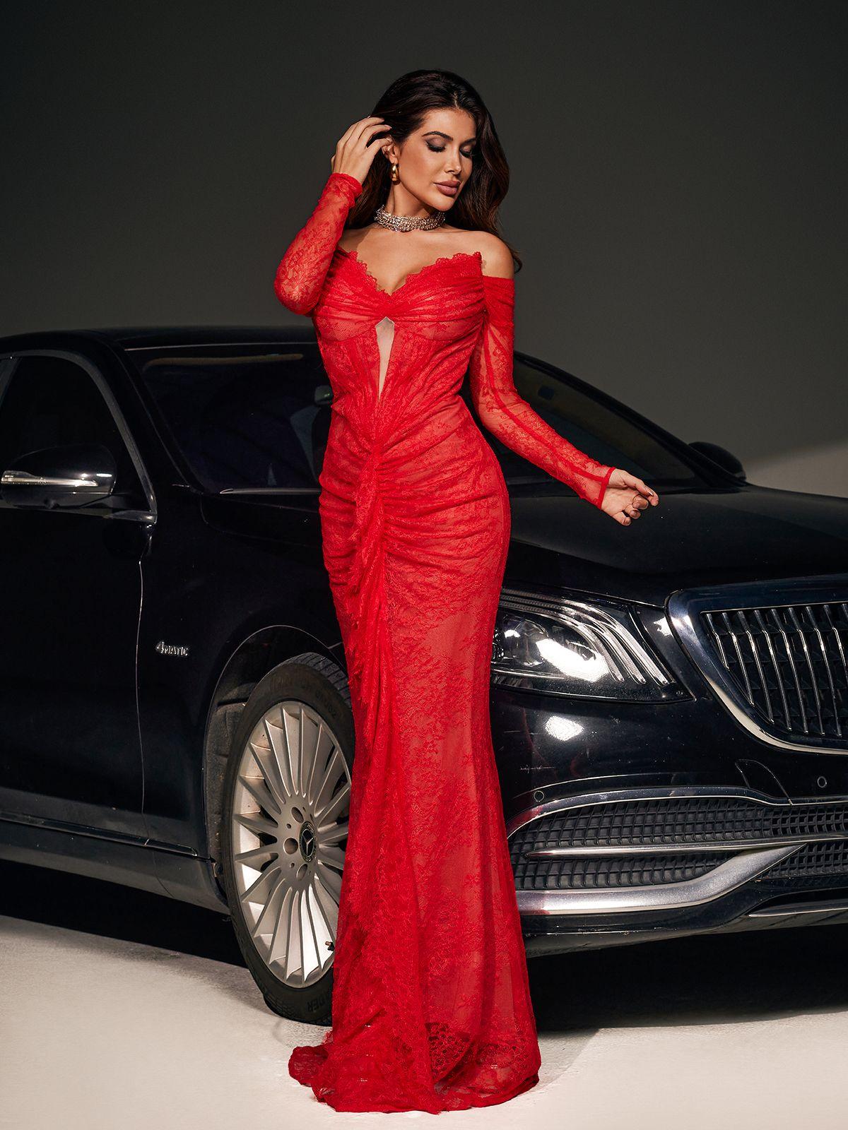Model wearing the Capella Off Shoulder Lace Mermaid Maxi Dress showcasing its intricate lace and elegant mermaid silhouette.