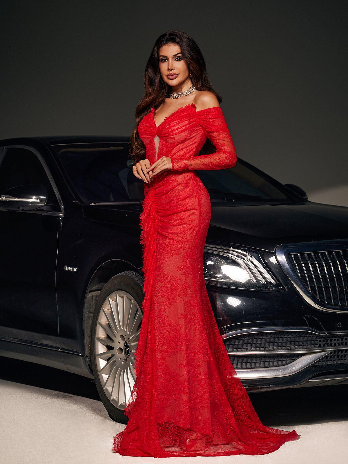 Model wearing the Capella Off Shoulder Lace Mermaid Maxi Dress showcasing its intricate lace and elegant mermaid silhouette.