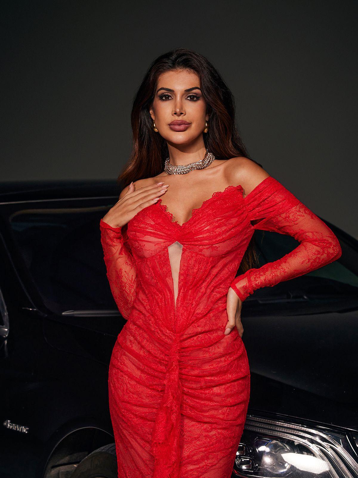 Model wearing the Capella Off Shoulder Lace Mermaid Maxi Dress showcasing its intricate lace and elegant mermaid silhouette.
