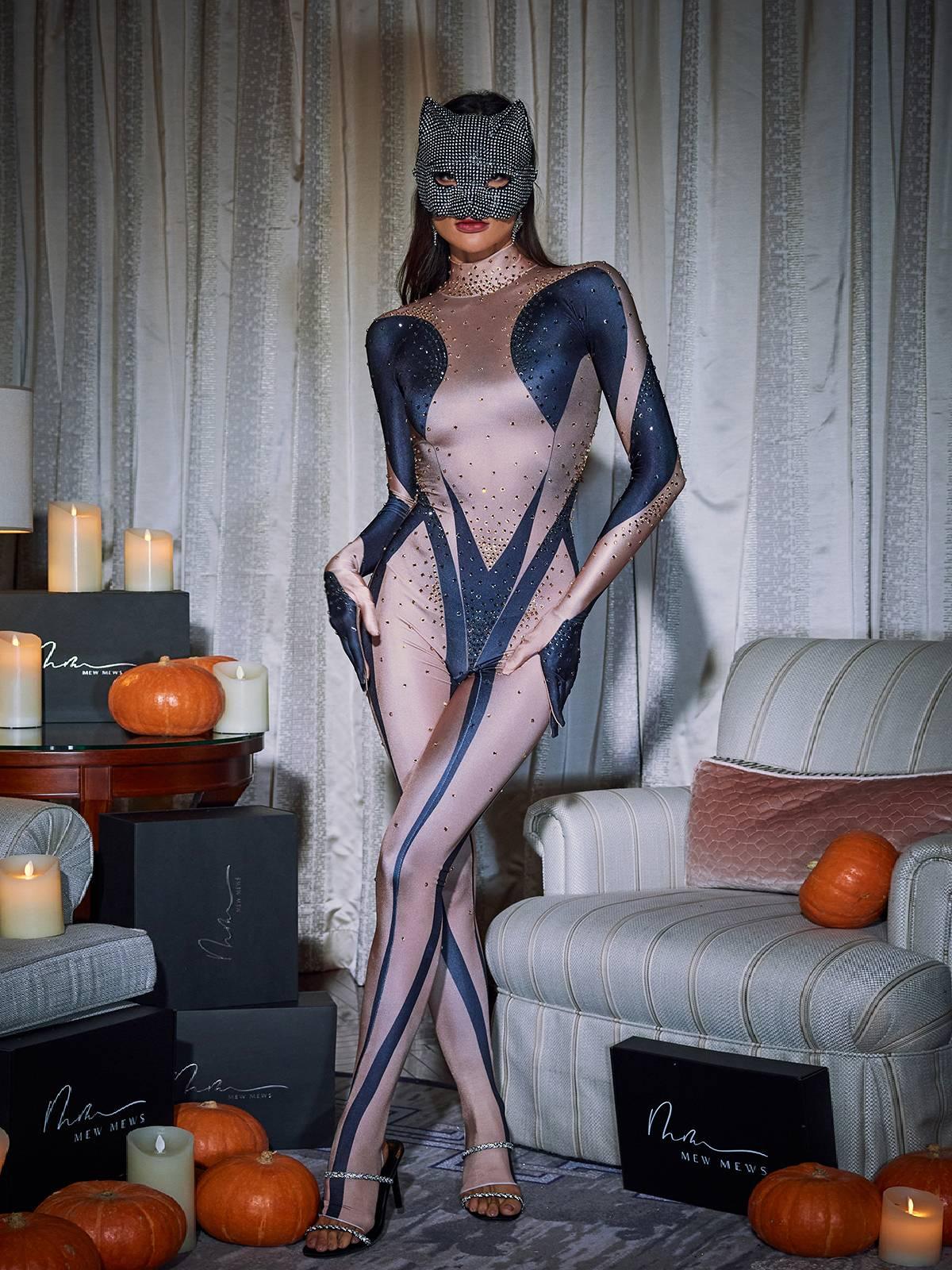 Carmelo Black Rhinestone Gloves Jumpsuit showcasing elegant design and long sleeves, perfect for sophisticated occasions.